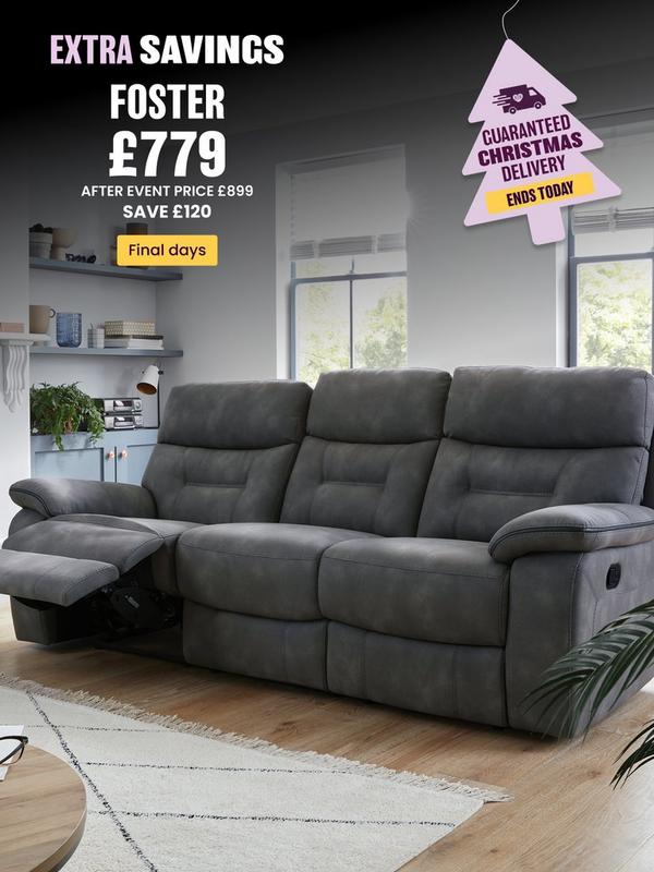 dark grey fabric recliner sofa next to fireplace