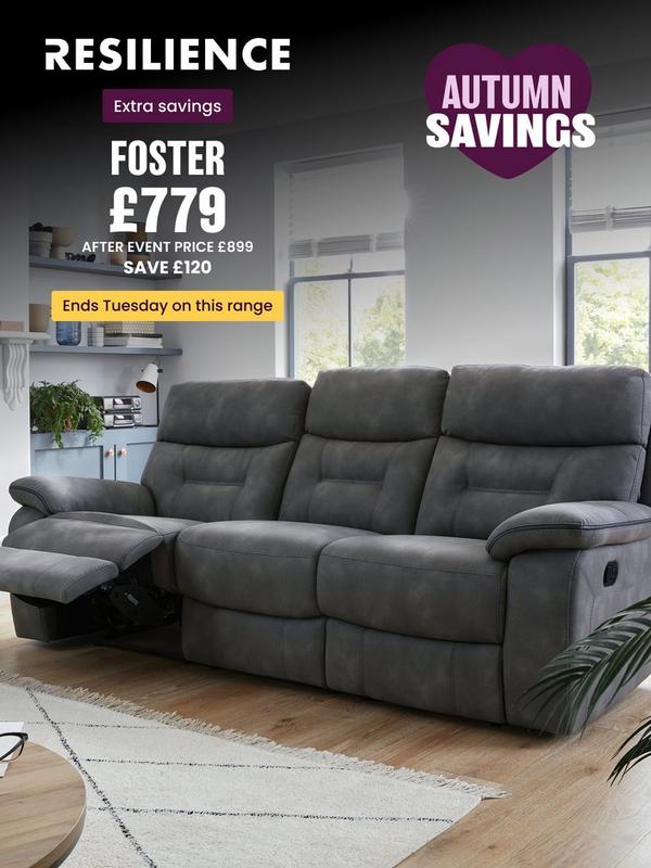 dark grey fabric recliner sofa next to fireplace