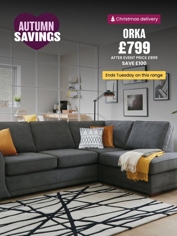 grey fabric corner sofa with mustard scatter cushions