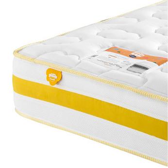 Side view of a yellow banded mattress on a white background