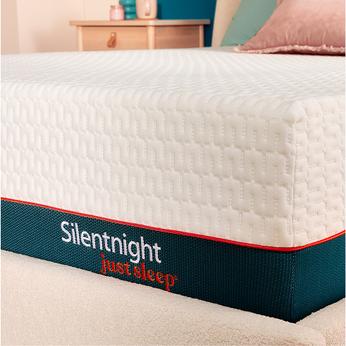 Side view of a mattress on a bed
