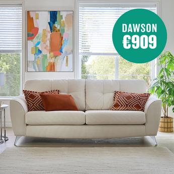 cream coloured sofa with dark orange scatter cushions