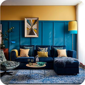 blue corner sofa in a blue and yellow room