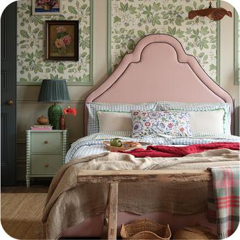 pink bed in a county house bedroom