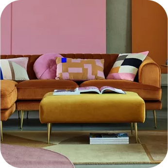 a retro themed room with a yellow sofa