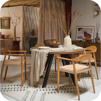 a spindle framed dining table and chairs