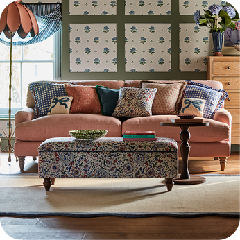 a retro-styled room with a bright blue sofa