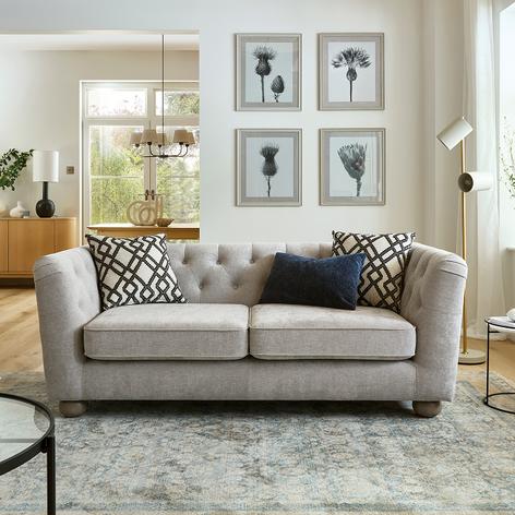 grey chesterfield style sofa