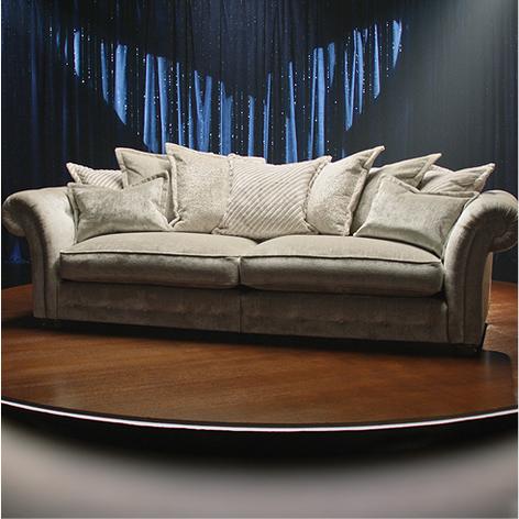 large cream chesterfield sofa on tv stage
