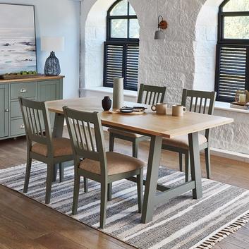 grey wooden dining table under a wooden dining table