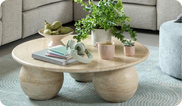 light wood coffee table with round feet