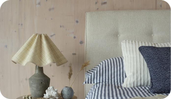 bed with striped linen