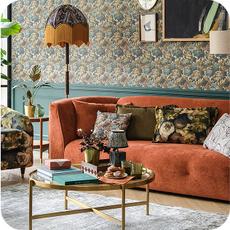 orange sofa on a laminate floor