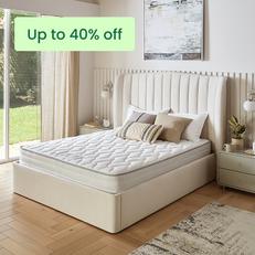 Mattress on a pink bedframe