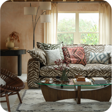 animal print sofa and nature themed room