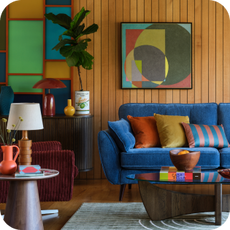 bright blue sofa and retro themed room
