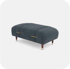 Blue footstool with gold detailing and dark wooden feet