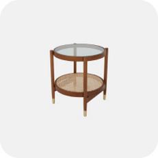 Roubnd wooden lamp table with a glass top and rattan base