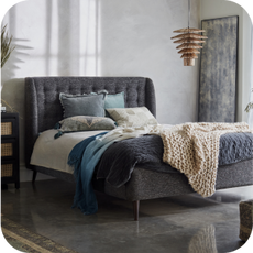 grey bed frame with mattress