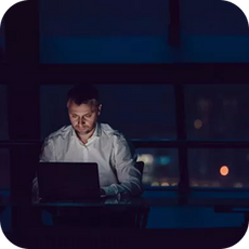 a person working late on their computer