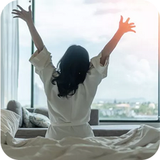 a person stretching as they get out of bed