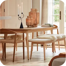 wooden dining table with padded chairs