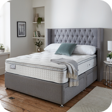 mattress on a grey bedframe