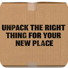 Cardboard box with unpack the right thing for your new place written on it