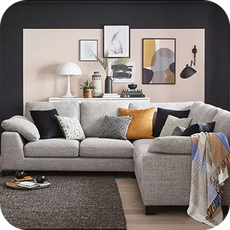 grey corner sofa in a black room
