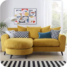 a yellow cord chaise sofa in a light room