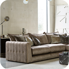 a large brown velvet corner sofa