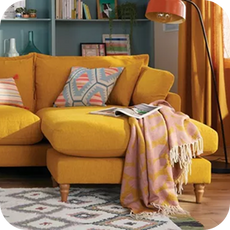 a bright yellow chaise sofa