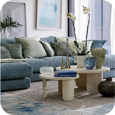 a large blue cord corner chaise sofa