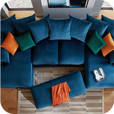 a top-down view of a large blue U-shaped sofa