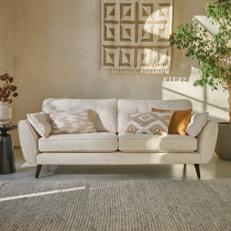 Cream boucle 4 seater sofa with neutral accents