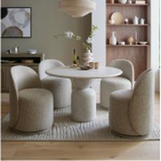 cream dining set on a neutral pattern rug