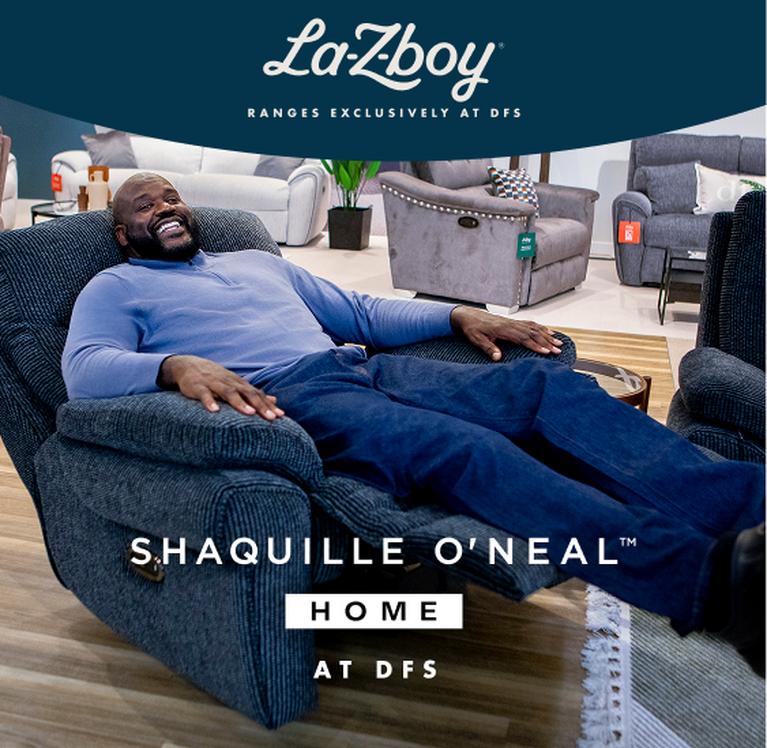 Shaquille O'Neal siting on a extra large La-Z-Boy recliner chair
