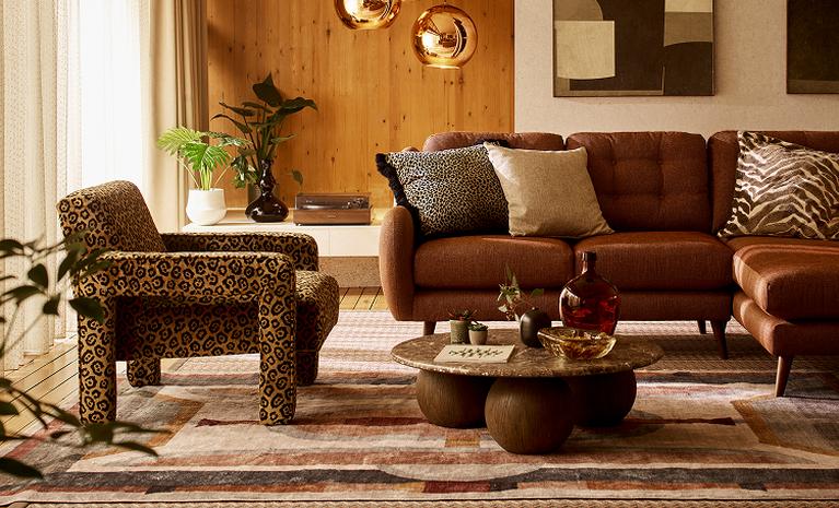 Leopard print accent chair with brown corner sofa