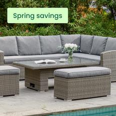 Grey oval table and chairs set in an outdoor setting