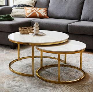 how to style a black sofa with halo gold coffee table