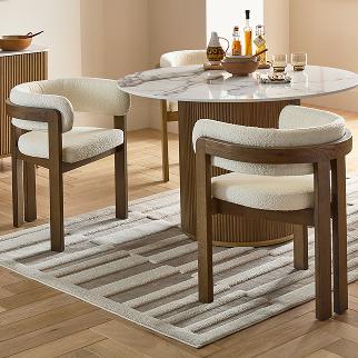 cream boucle and wood dining chairs