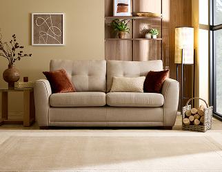 A cream sofa in a brightly lit room