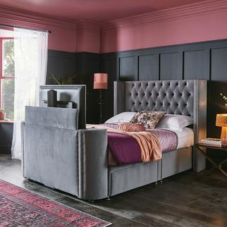 Grey velvet TV bed with studded detail and buttoned headboard