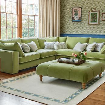 apple green corner sofa with footstool