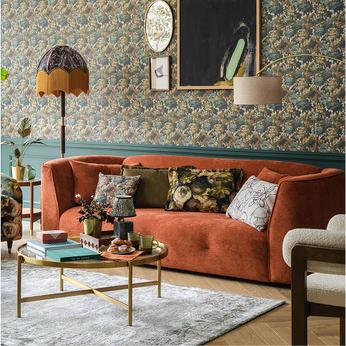 a curved orange sofa