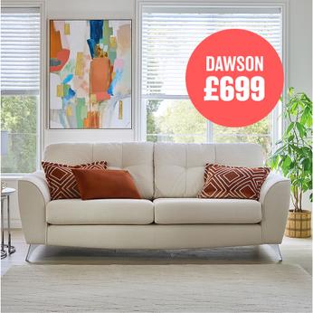cream coloured sofa with dark orange scatter cushions