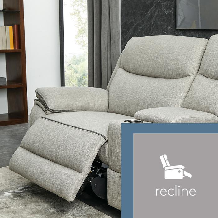 A cream sofa reclined