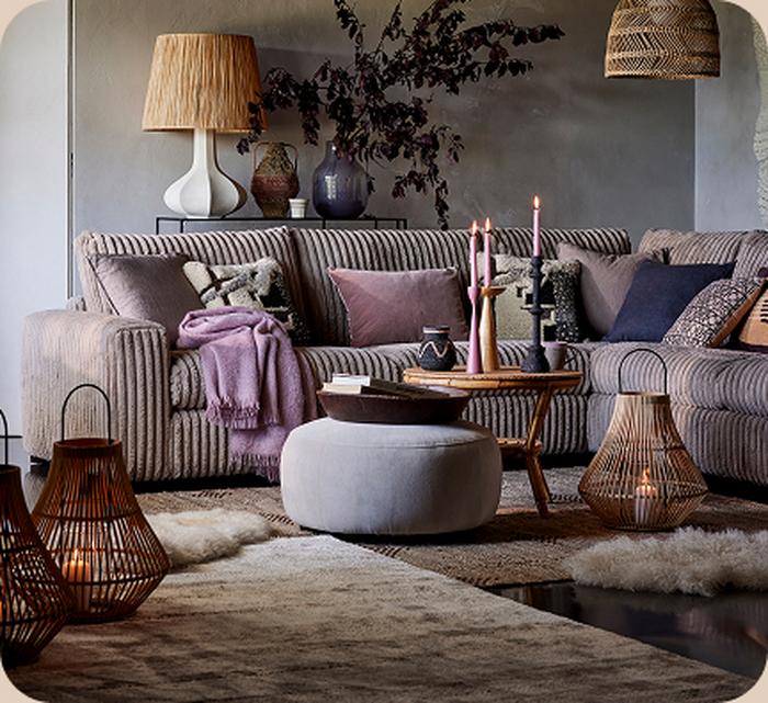 Grey corner sofa with lilac accents