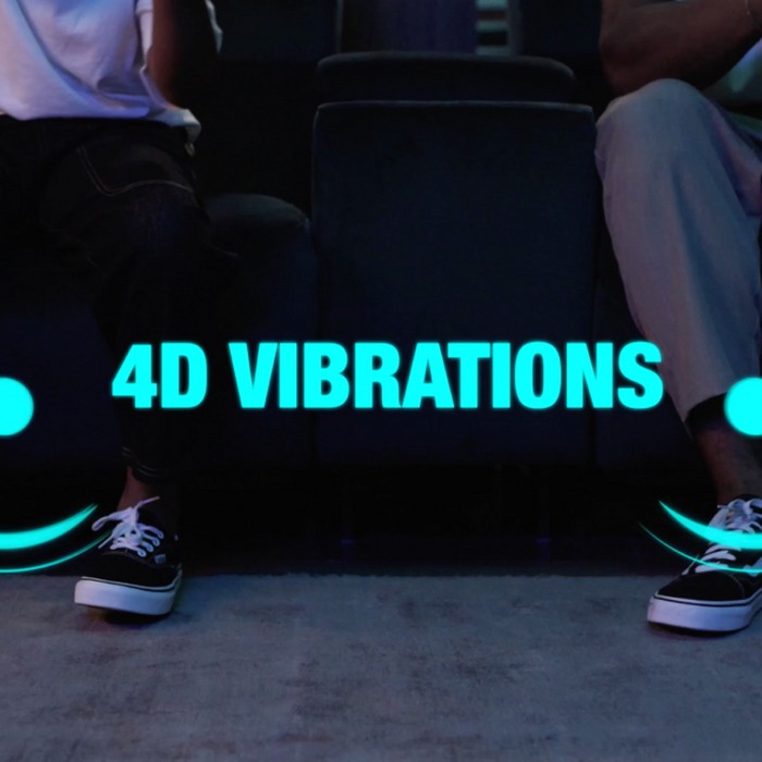 A couple sat on vibrating seats