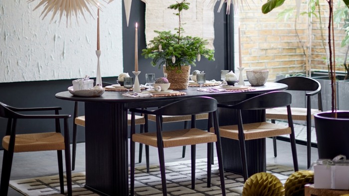a black and wood dining table set